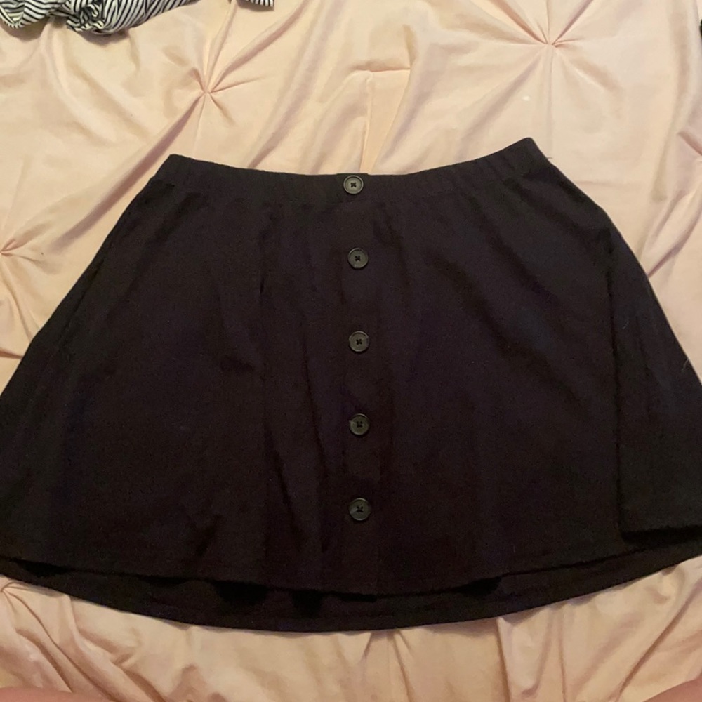 Black slide on skirt